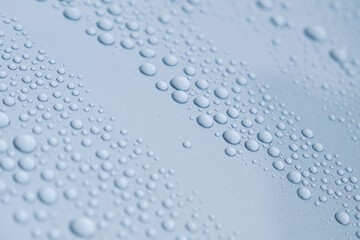 車の塗装にはじかれた水滴　ワックス　雨