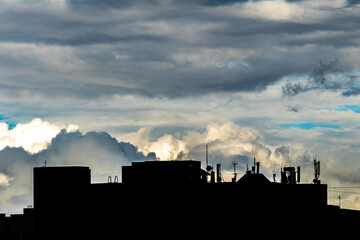 sunset and clouds over the city