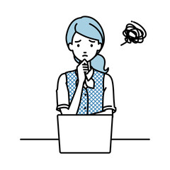 デスクで座ってPCを開いて困っている事務員制服の女性