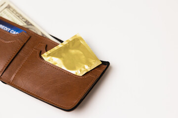 Condom in the wall ready to use anytime anywhere. Campaign for safe sex and contraception.