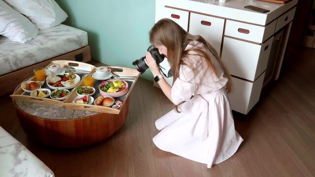 Young Female Photographer Make Photoshoot of Fresh Breakfast in Hotel. Behind the Scenes. Backstage of Woman with Digital Camera Working and Shooting Food. 4k