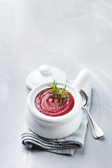 Seasonal fall autumn creamy beetroot soup on a table