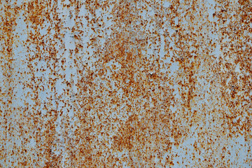 The picture shows a textured pattern created by rusting an equal metal surface.