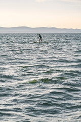 Man paddling sup surf in the lake