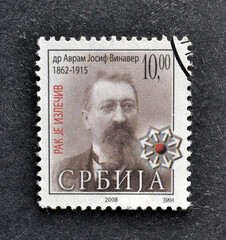 Cancelled postage stamp printed by Serbia, that shows md Avram Josif Vinaver, promoting fight...