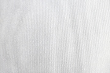 Fototapeta na wymiar White denim jeans texture with vertical longitudinal thread lines 