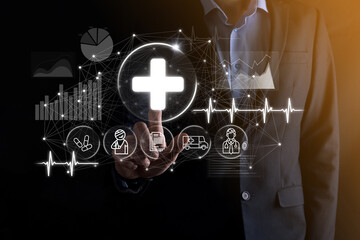 Businessman hold virtual plus medical network connection icons. Covid-19 pandemic develop people awareness and spread attention on their healthcare.Doctor,document,medicine,ambulance,patient icon.