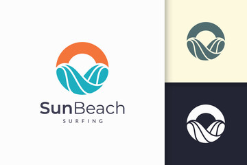Fototapeta premium Ocean or sea logo in abstract water wave and sun represent adventure