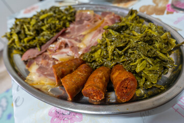 Chorizo, turnip greens and cooked pork shoulder.