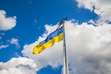 Flag of Ukraine on blue sky background. Flag of ukraine on a flagpole