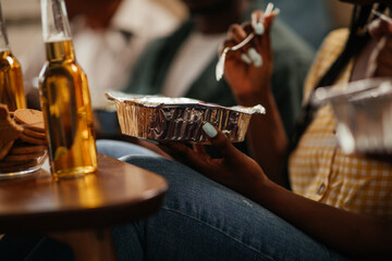 Close up of woman holding takeout food package
