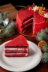 Slice of Red velvet cake decorated for Christmas.