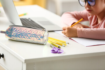 Stylish pencil case on table, closeup