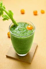 Glass of bloody Mary cocktail on color background