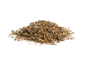Pile of dry hojicha green tea on white background