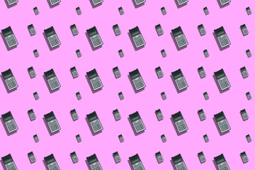 Geometric composition with repeating scientific calculators on Pink pastel background. Science,...