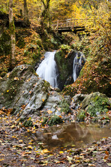 Rocks around the Rausch, or Maria Endertal, waterfall near Cochem, Germany on a fall day.