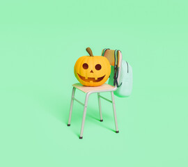 Happy Halloween pumpkin on a school chair