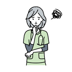 立って手をあごにあてて困っている看護師の女性