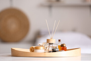 Tray with beautiful spa composition in salon