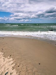 cloudy seascape, natural colors, empty beach