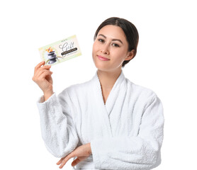 Young Asian woman with gift certificate for massage on white background