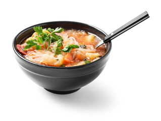 Bowl with tasty sauerkraut soup on white background