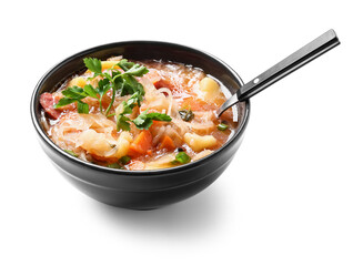Bowl with tasty sauerkraut soup on white background