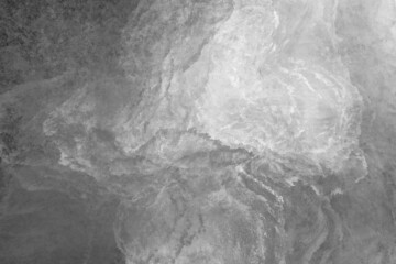 Abstract liquid black and white paint background 