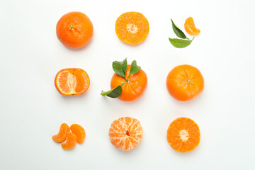 Flat lay with mandarins on white background