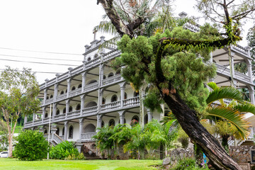 La Domus (Capuchin House), colonial style residential building of cathedral priests (presbytery), former house the Swiss missionaries, architectural gem of Victoria, Mahe Island, Seychelles. - obrazy, fototapety, plakaty