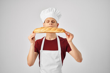chef with loaf in hand baking food preparation professionals