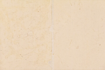 .The texture of polished beige granite.