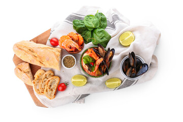 Bowl of tasty Cacciucco soup and ingredients on white background