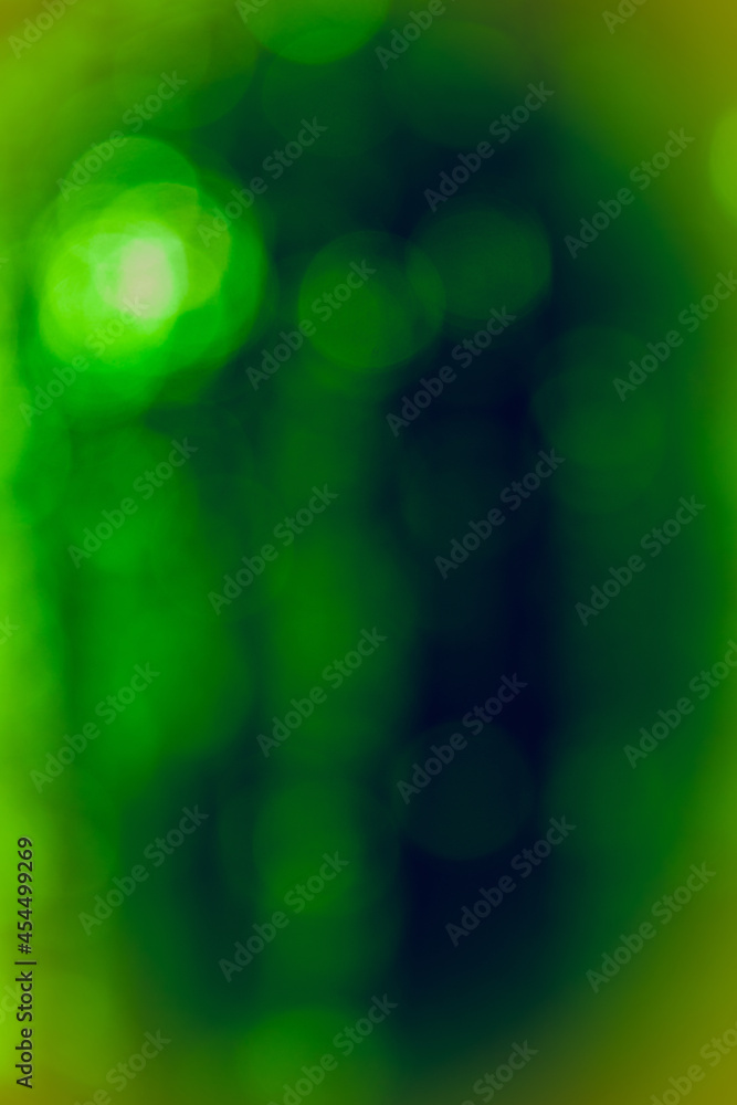 Poster abstract bokeh circles design on a gree background