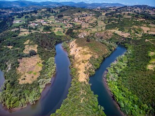 Fototapeta na wymiar Meanders of the Nora river in Asturias, Spain.