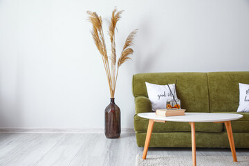 Interior of modern room with table and sofa