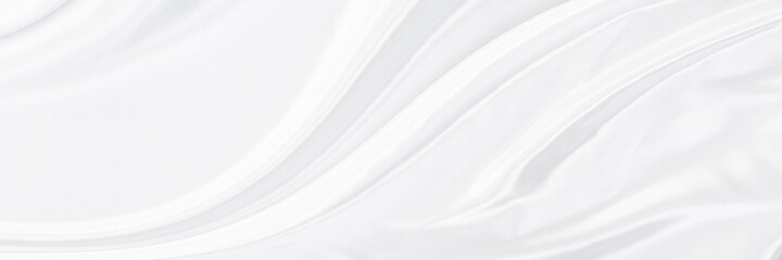 Obraz na płótnie Canvas White gray satin texture that is white silver fabric silk panorama background with beautiful soft blur pattern natural.
