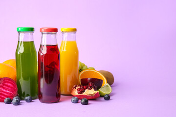 Bottles with healthy juice, fruits and vegetables on color background