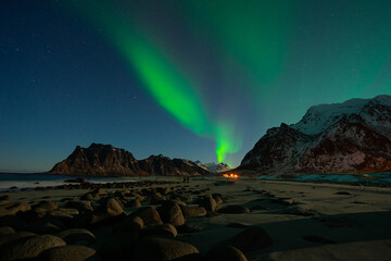 Aurora borealis or northern light over Uttakleiv beach in Lofoten island, winter season in Norway, Scandinavia