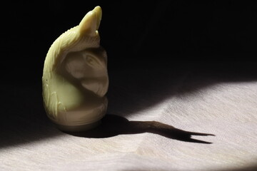 black house chess piece on the shade go into the light beautiful abstract background