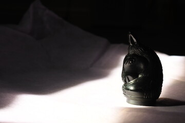 black house chess piece on the shade go into the light beautiful abstract background