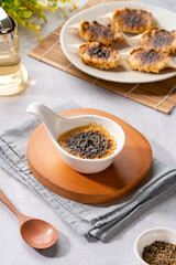 Grilled Crab with mentaiyaki sauce. Mentaiyaki is a typical Japanese sauce made from cod or pullock fish eggs mixed with mayonnaise and is usually processed or mixed in Japanese food. 