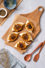 Grilled Crab with mentaiyaki sauce. Mentaiyaki is a typical Japanese sauce made from cod or pullock fish eggs mixed with mayonnaise and is usually processed or mixed in Japanese food. 
