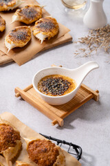 Grilled Crab with mentaiyaki sauce. Mentaiyaki is a typical Japanese sauce made from cod or pullock fish eggs mixed with mayonnaise and is usually processed or mixed in Japanese food. 