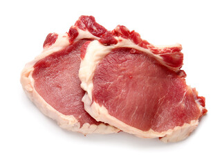 Raw pork steaks on white background