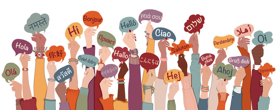 Many arms raised of diverse and multi-ethnic people holding speech bubbles with text -hallo- in various international languages. Diversity people.Racial equality.Sharing and collaboration