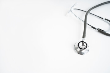 Fototapeta na wymiar Gray stethoscope for doctor, medical tool for health on white background with copy space.