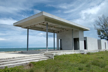 Unfinished precast concrete beach house