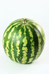A whole watermelon isolated on a white